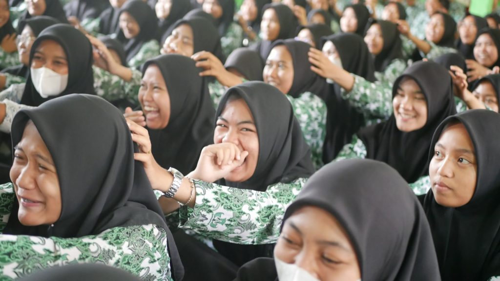 a group of women wearing headscarves and covering their faces